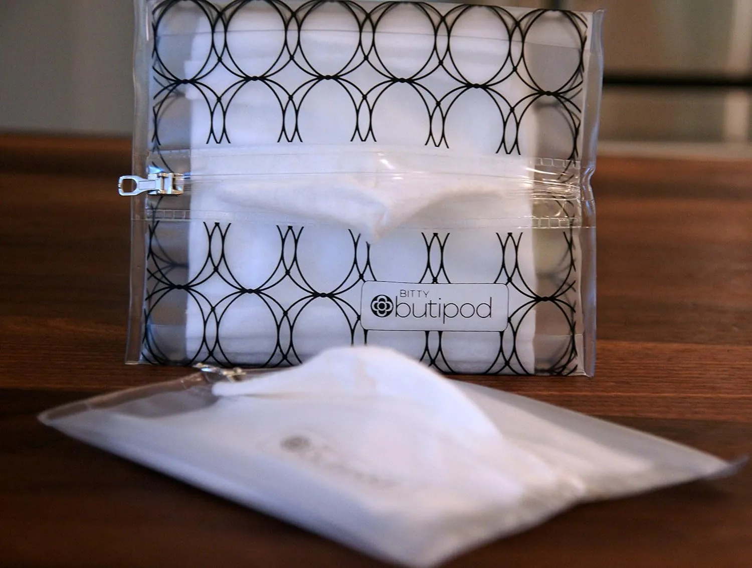 Butipods Reusable Stay Moist Wet Wipe Pouch | Slim Case Travel Holder | Great for Hand and Face Wipes | Set of 2 (Bitty (mini size) Black and Clear)